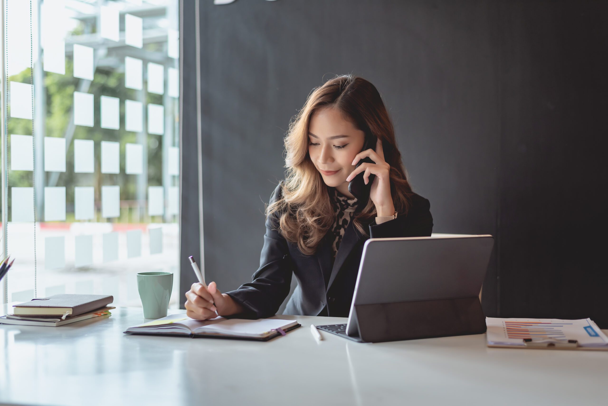 business women working in hotel revenue management